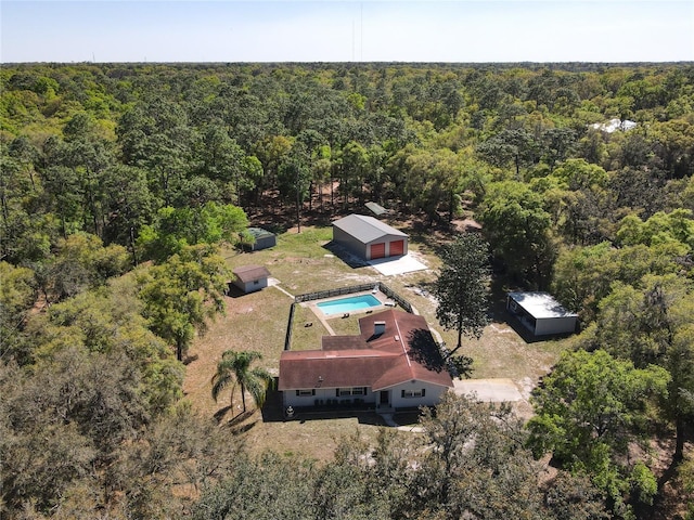 drone / aerial view with a view of trees