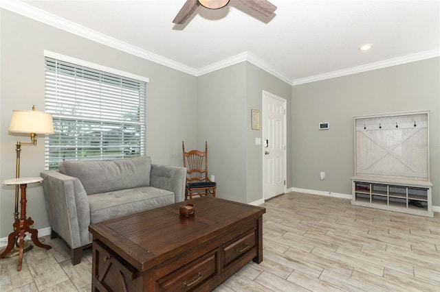 living room featuring ornamental molding, baseboards, and wood tiled floor