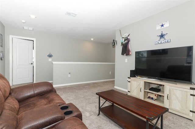 living area featuring recessed lighting, visible vents, baseboards, and light colored carpet