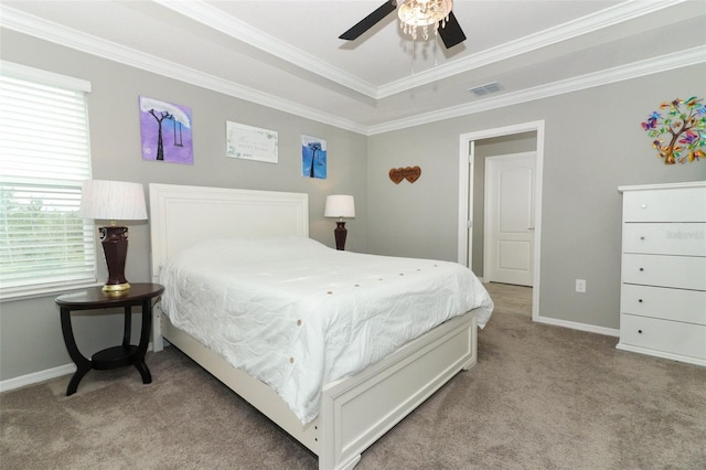 bedroom featuring crown molding, carpet, visible vents, and baseboards