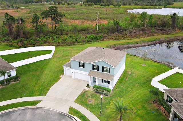 birds eye view of property featuring a water view