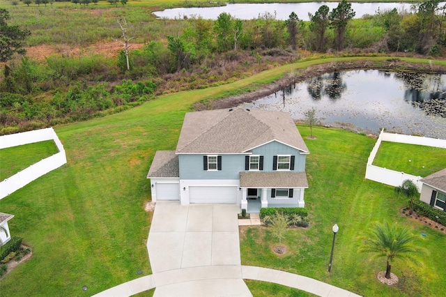 drone / aerial view with a water view