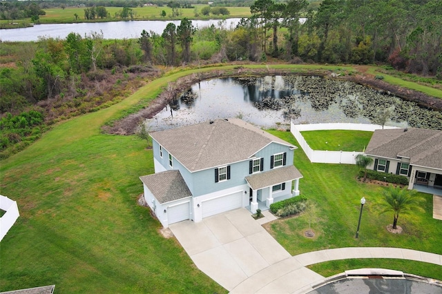 drone / aerial view with a water view