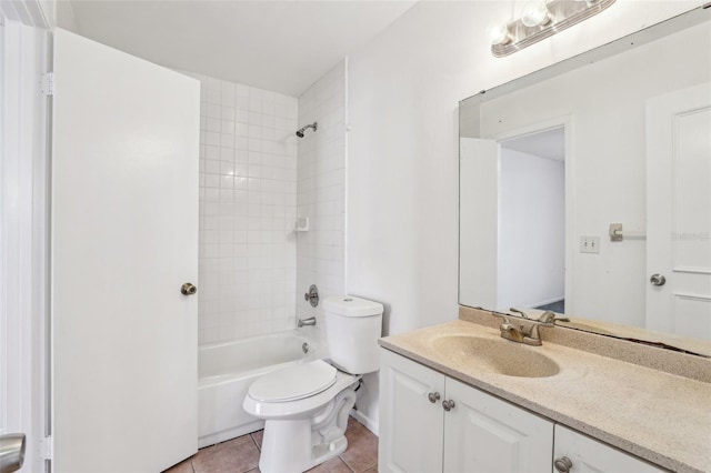 full bath featuring vanity, tile patterned floors, toilet, and bathing tub / shower combination