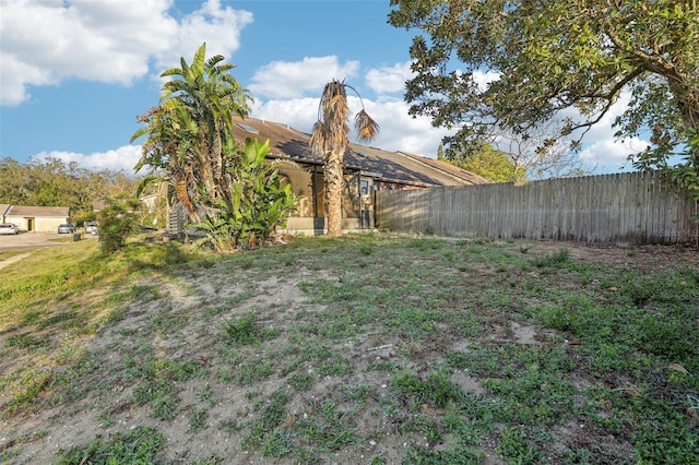 view of yard featuring fence