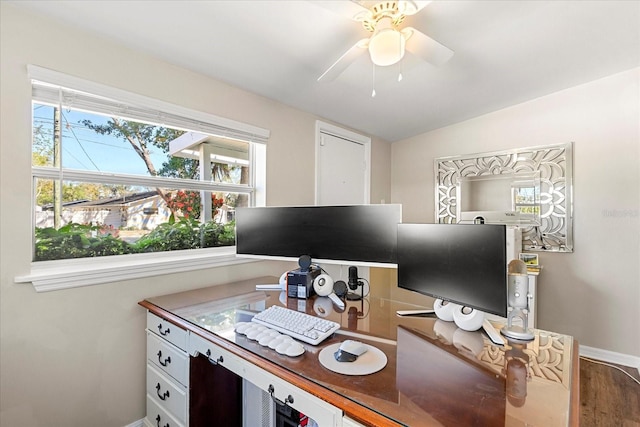 home office featuring ceiling fan, baseboards, and wood finished floors