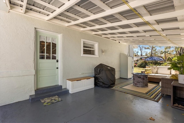 view of patio with outdoor lounge area and area for grilling