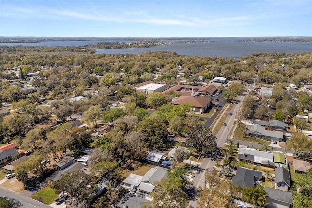 birds eye view of property featuring a water view and a residential view