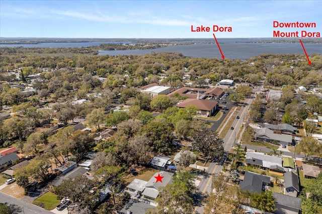 bird's eye view featuring a water view and a residential view