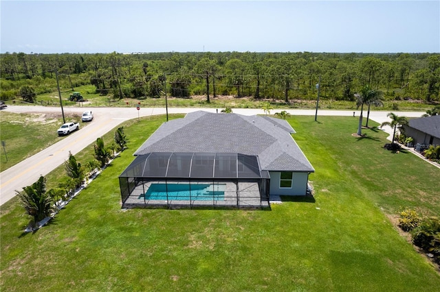 291 Rotonda Blvd S, Rotonda West, FL 33947 - view of subject property featuring a forest and a pool