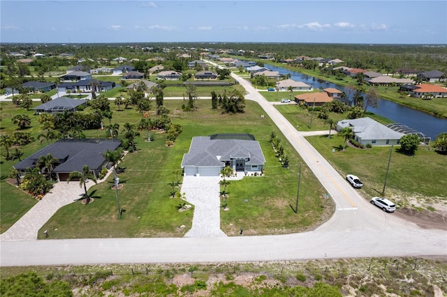 291 Rotonda Blvd S, Rotonda West, FL 33947 - aerial perspective of suburban area featuring a large body of water