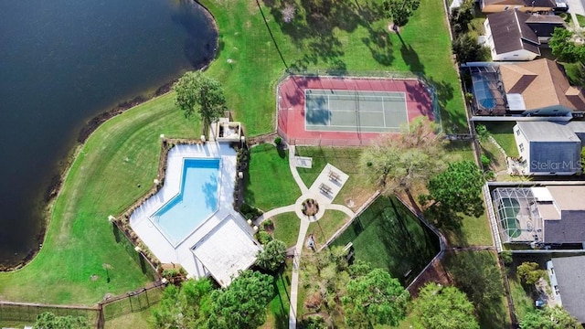 birds eye view of property with a water view