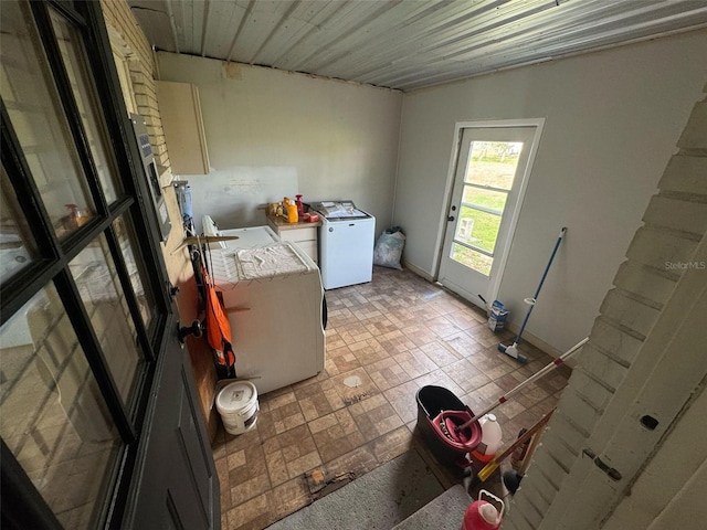 kitchen with washer and dryer and light countertops