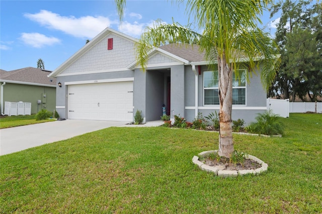 single story home with an attached garage, fence, driveway, and stucco siding