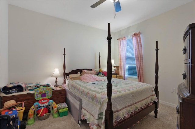 bedroom featuring baseboards, carpet floors, and ceiling fan