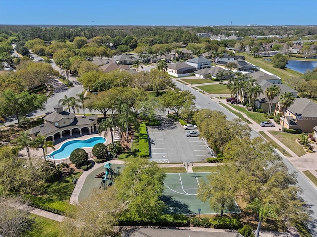 birds eye view of property with a residential view