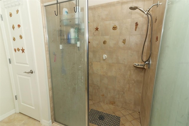 bathroom with a shower stall