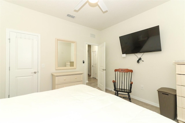 bedroom with visible vents, ceiling fan, carpet, and baseboards