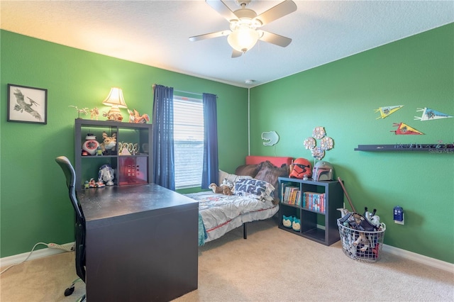 bedroom featuring carpet flooring, baseboards, and a ceiling fan