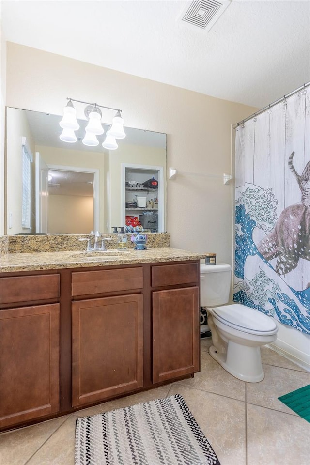 full bath featuring vanity, visible vents, tile patterned flooring, curtained shower, and toilet