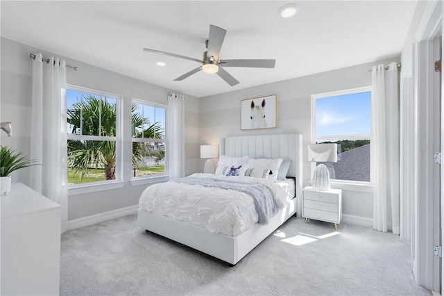 carpeted bedroom with recessed lighting, ceiling fan, and baseboards