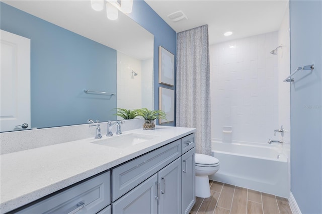 bathroom with shower / bath combination with curtain, toilet, vanity, and wood tiled floor