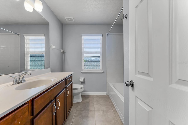 bathroom featuring vanity, visible vents, tile patterned flooring, shower / bathing tub combination, and toilet