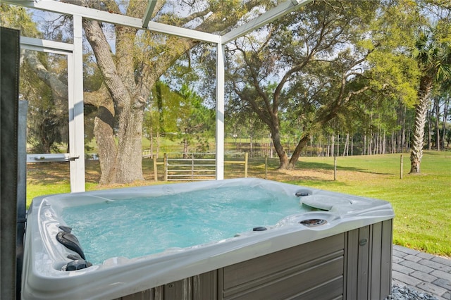 exterior space with a hot tub