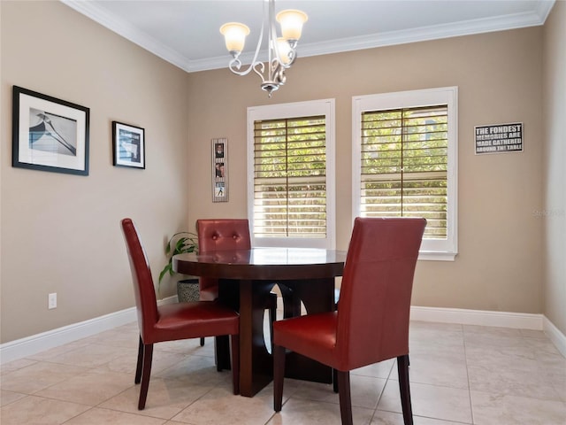 dining space featuring a chandelier, light tile patterned floors, crown molding, and baseboards