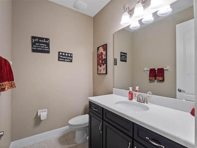 bathroom with vanity, baseboards, toilet, tile patterned floors, and a notable chandelier