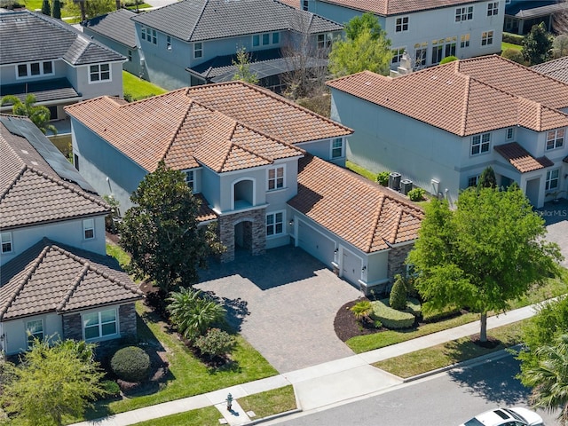 birds eye view of property with a residential view