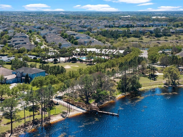 bird's eye view featuring a residential view and a water view