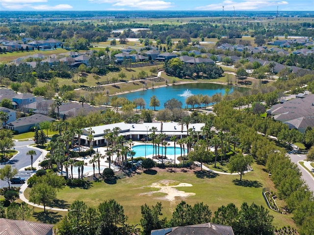 bird's eye view featuring a water view and a residential view