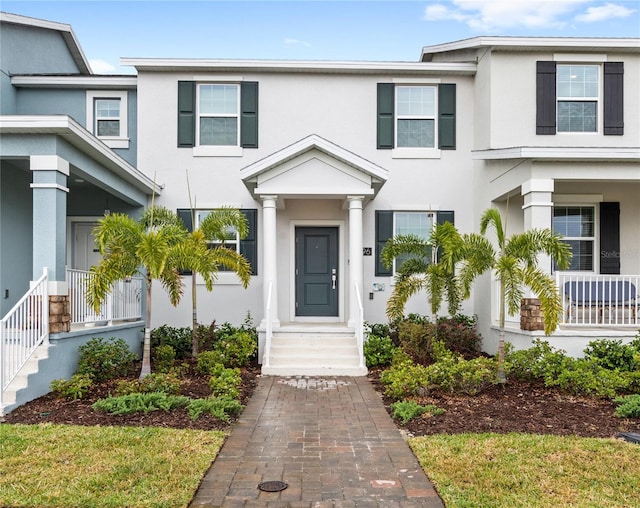 view of front of property featuring stucco siding