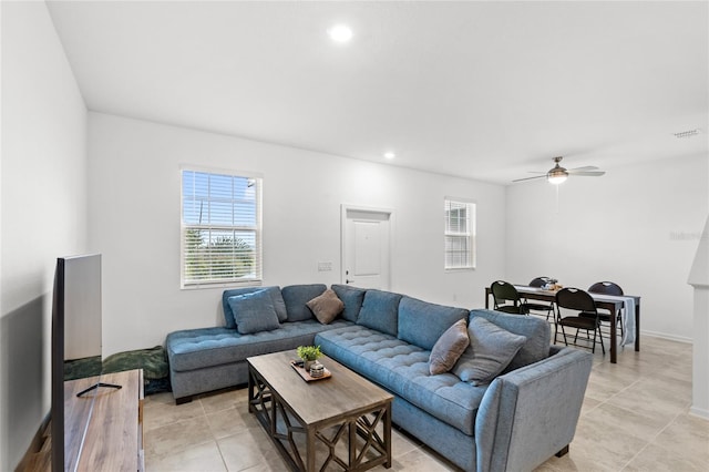 living area with visible vents, recessed lighting, light tile patterned floors, baseboards, and ceiling fan