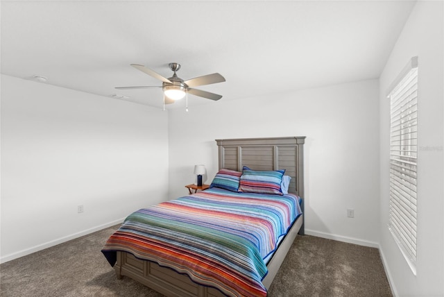 carpeted bedroom with visible vents, ceiling fan, and baseboards