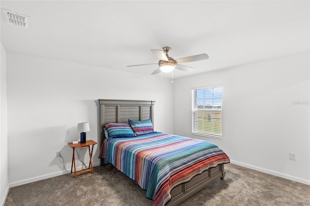 bedroom featuring ceiling fan, carpet, visible vents, and baseboards