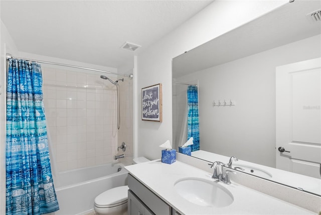 bathroom with vanity, toilet, shower / bath combo, and visible vents