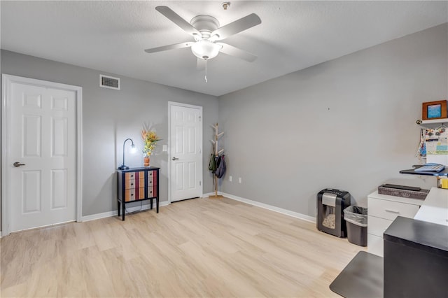 445 Bouchelle Dr Unit 104, New Smyrna Beach, FL 32169 - office featuring light wood-style flooring and ceiling fan