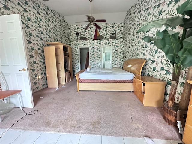 unfurnished bedroom with wallpapered walls and carpet floors