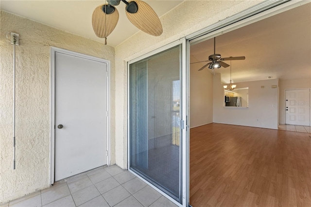 interior space with a ceiling fan