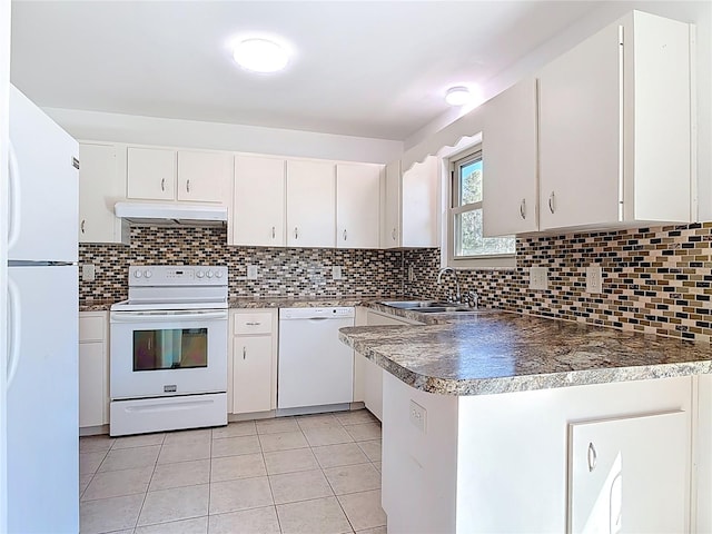 kitchen featuring a sink, white appliances, backsplash, and under cabinet range hood