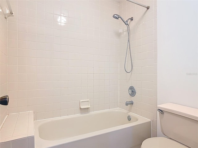 full bathroom featuring shower / tub combination and toilet