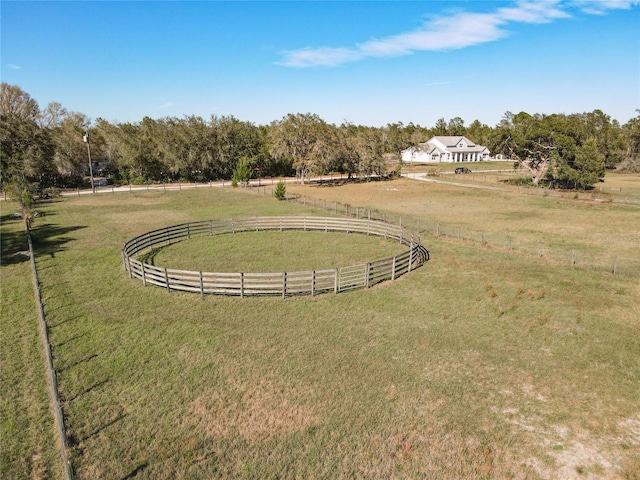 view of yard with a rural view