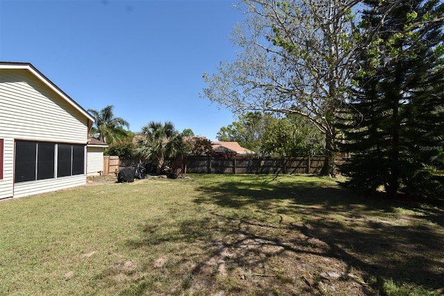 view of yard featuring fence