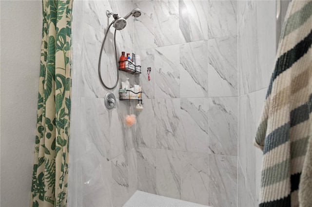 full bathroom featuring a tile shower