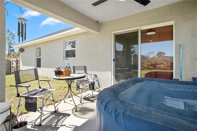 view of patio / terrace with a ceiling fan