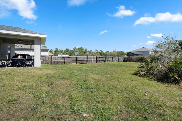 view of yard with fence