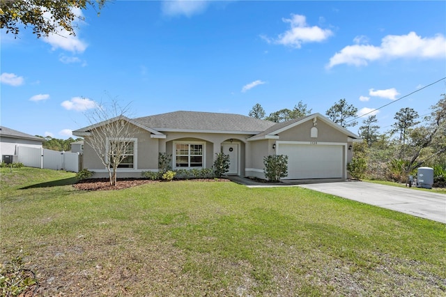 ranch-style house with fence, an attached garage, stucco siding, concrete driveway, and a front lawn