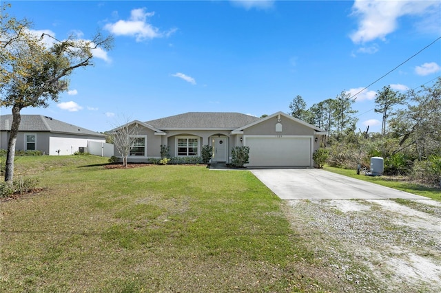 single story home featuring a garage, a front yard, driveway, and stucco siding